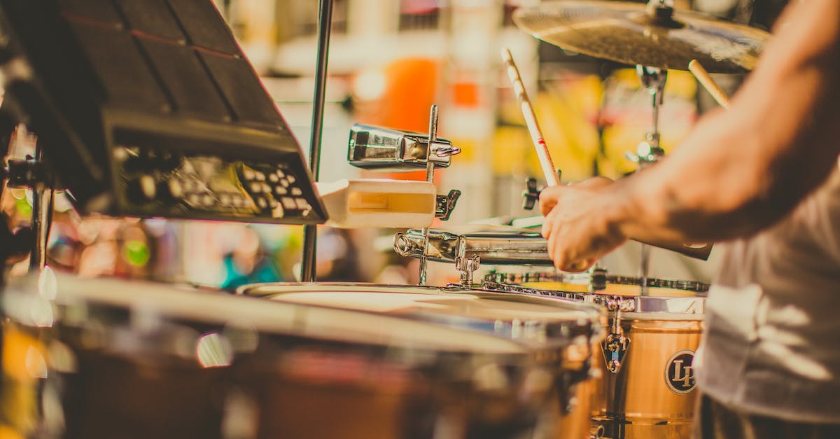 Is there some way to use my Guitar Hero drum pedal on my PC? - Person Playing The Drums Is there some way to use my Guitar Hero drum pedal on my PC? - Person Playing The Drums