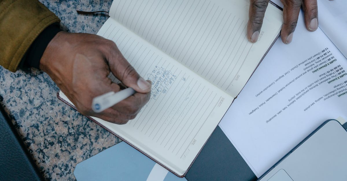 Is there such a genre where the main gameplay focuses on writing bots? - Close-up of Man Writing in a Notebook Is there such a genre where the main gameplay focuses on writing bots? - Close-up of Man Writing in a Notebook