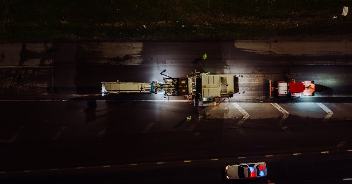 Is there way to fix save files? - Top view of specialized vehicles with lights on repairing road and laying asphalt and concrete at night Is there way to fix save files? - Top view of specialized vehicles with lights on repairing road and laying asphalt and concrete at night