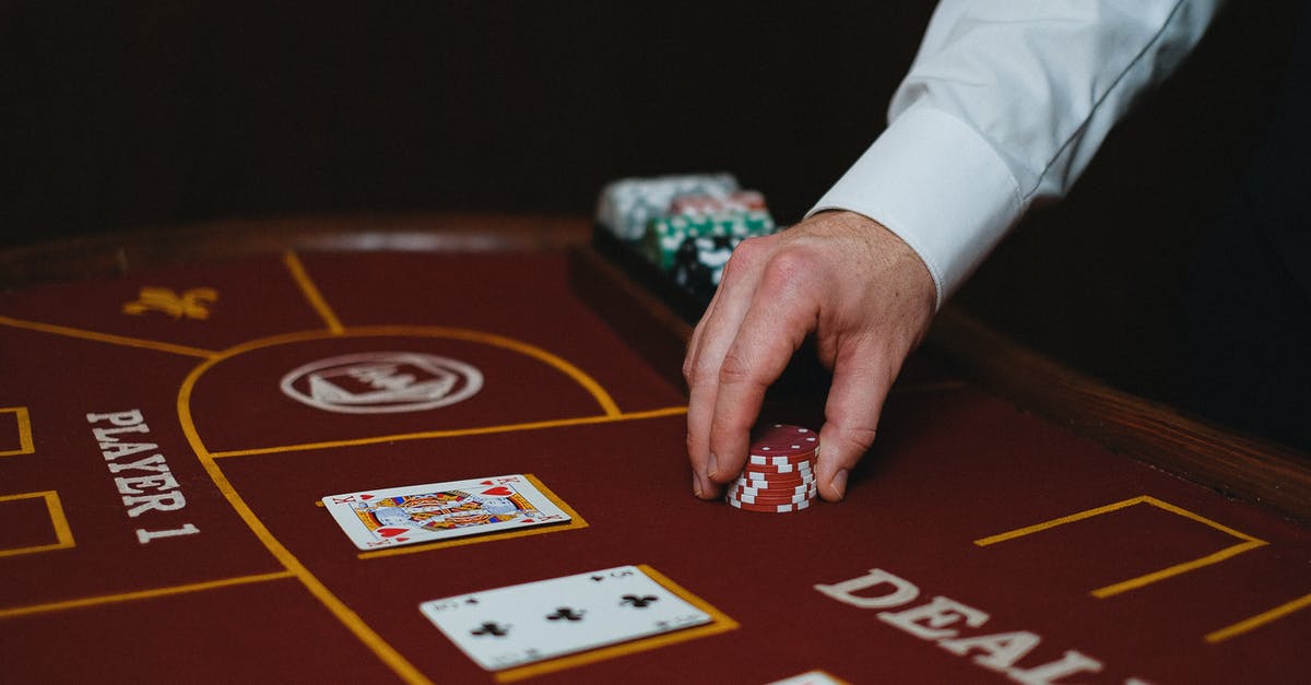 Is this possible to load a saved game faster? - Person in White Long Sleeve Shirt Holding Playing Cards Is this possible to load a saved game faster? - Person in White Long Sleeve Shirt Holding Playing Cards