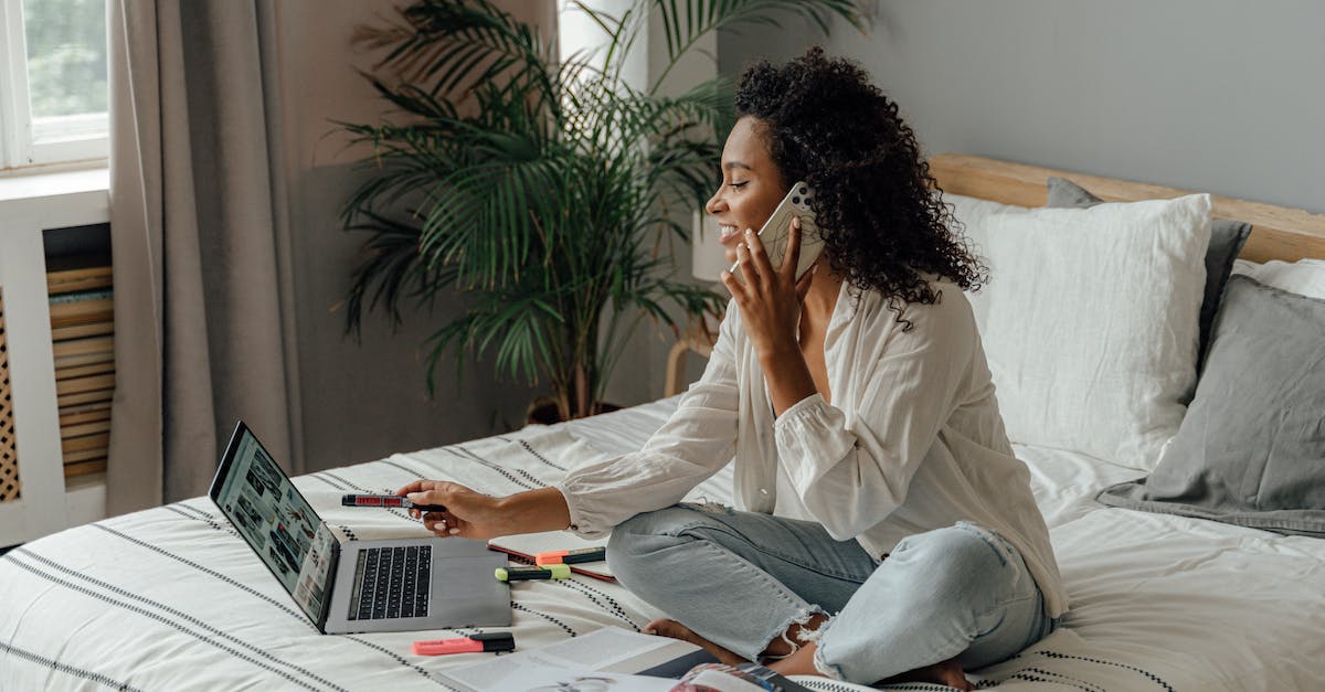 Is using a shield effective? - Woman in White Long Sleeve Shirt Sitting on Bed