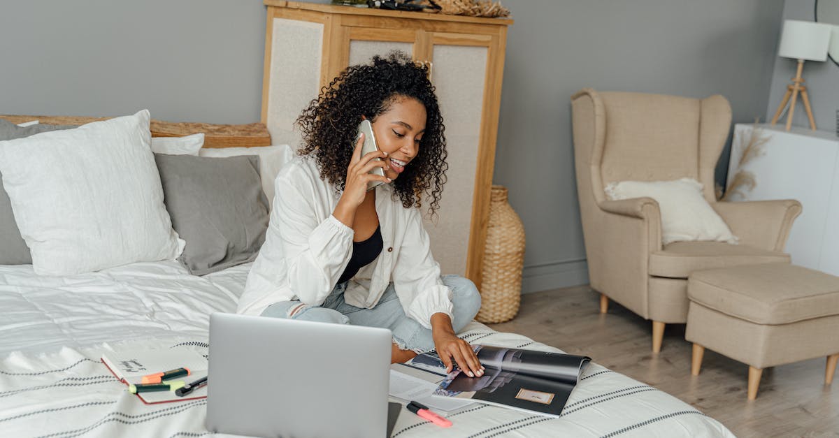 Is using a shield effective? - Woman in White Long Sleeve Shirt Sitting on White Bed