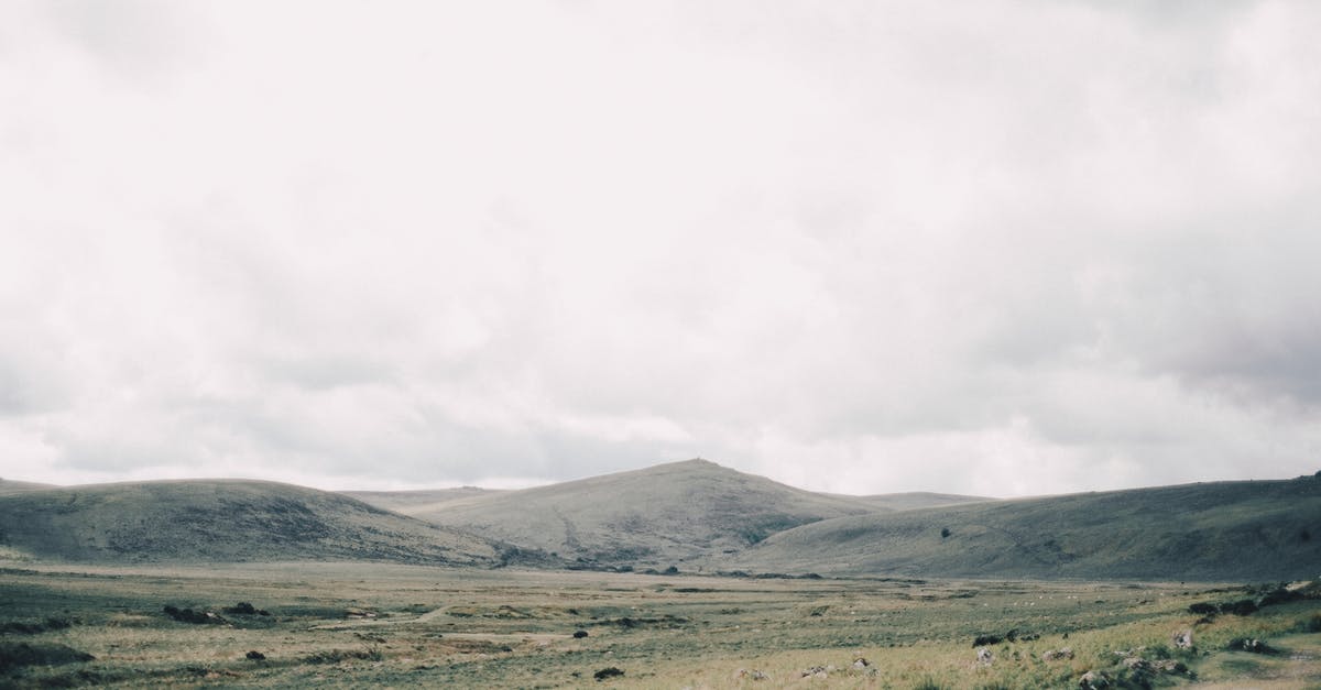 Is weather localized or map-wide? - Amazing landscape of hills and dry grassy meadow located in rural area under dramatic gray sky Is weather localized or map-wide? - Amazing landscape of hills and dry grassy meadow located in rural area under dramatic gray sky