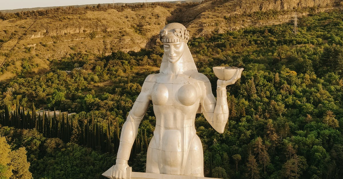 Isshin, the Sword Saint phase 2 no spear - White Angel Statue Near Green Trees