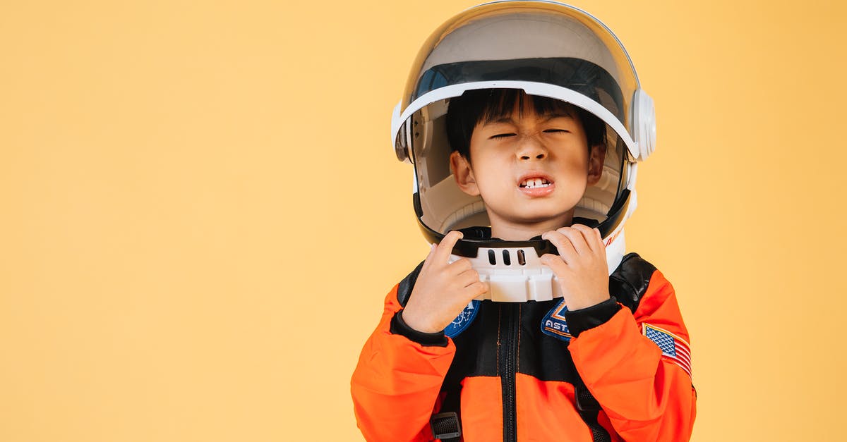 Issues Unlocking the Dream Suit - Asian kid wearing astronaut helmet Issues Unlocking the Dream Suit - Asian kid wearing astronaut helmet