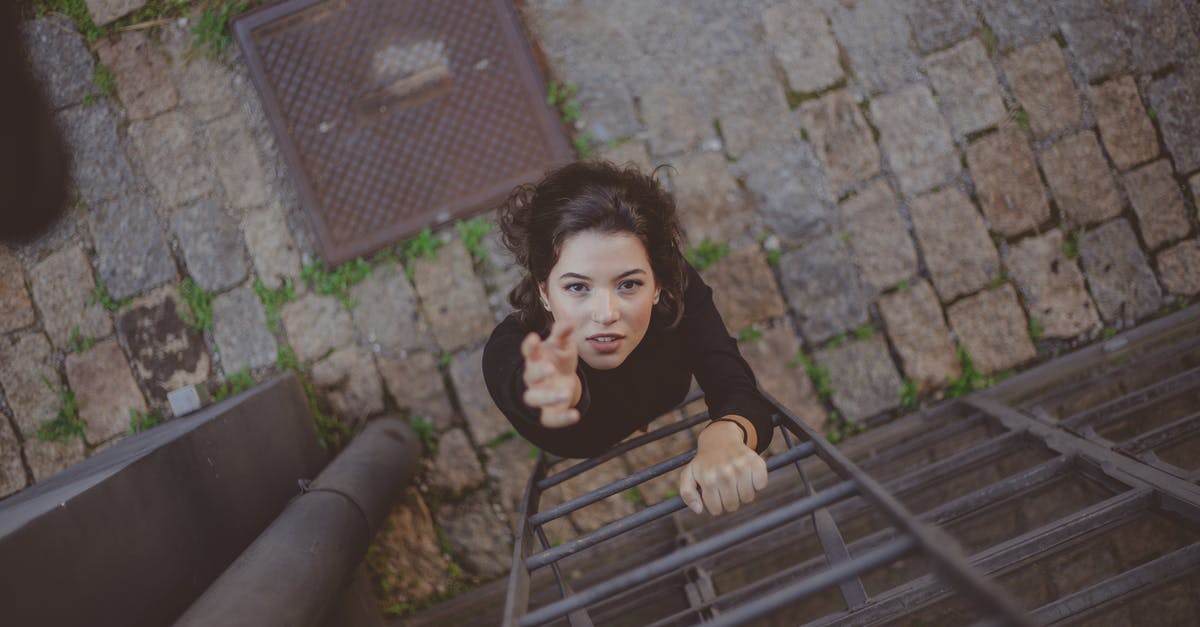 Jetpack turning on when I finish climbing a ladder on my rover? - Photo of Woman Climbing on Ladder