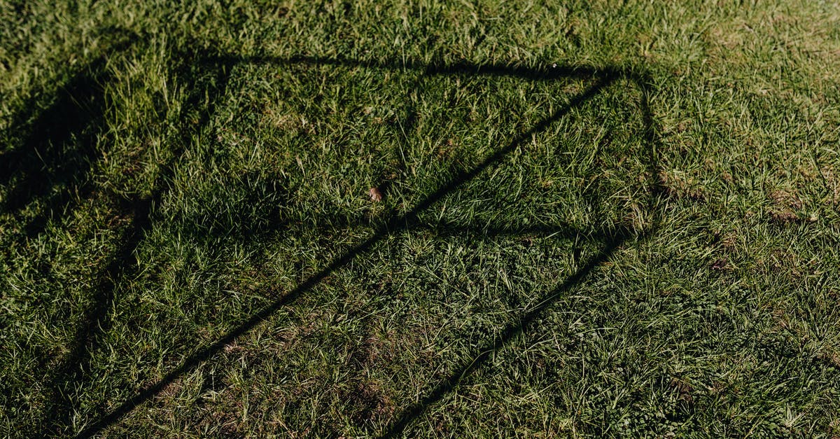 Keeping patterns on the ground when I remove the design from my inventory - From above of green lawn with abstract shadow drawing on grass on sunny day Keeping patterns on the ground when I remove the design from my inventory - From above of green lawn with abstract shadow drawing on grass on sunny day