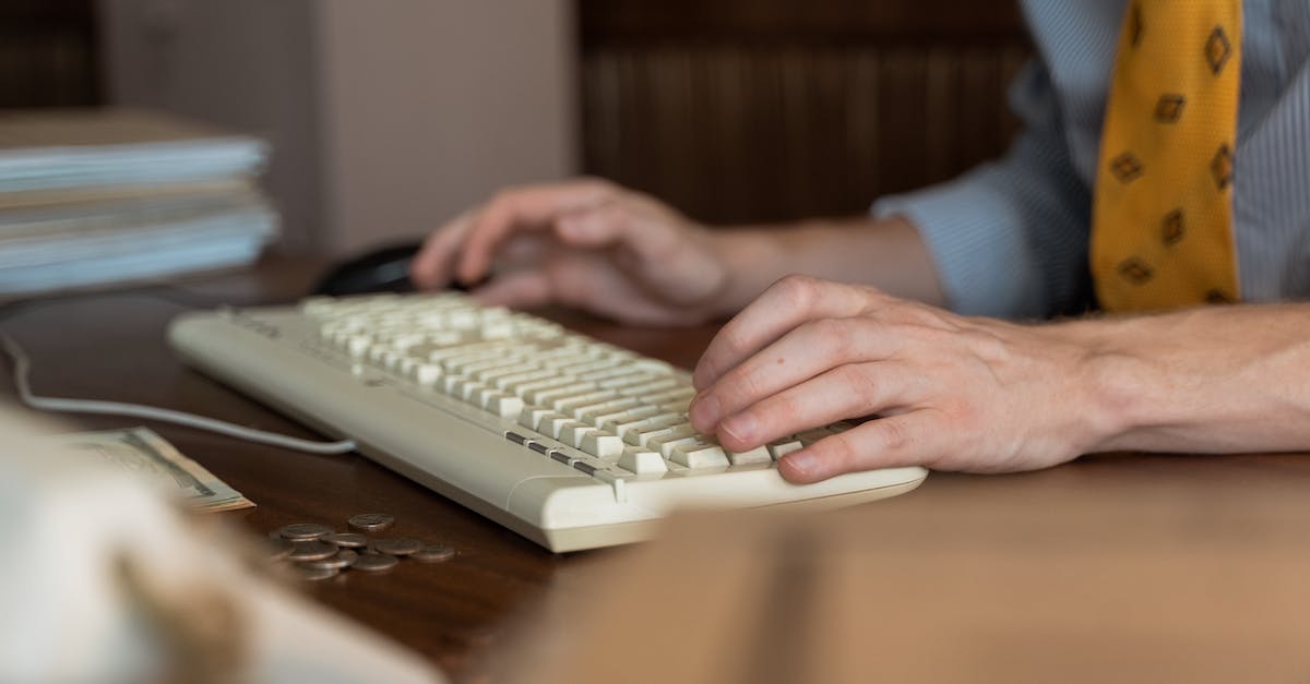 Keyboard issue with Batman Arkham Asylum - A Person's Hands Typing on a Keyboard Keyboard issue with Batman Arkham Asylum - A Person's Hands Typing on a Keyboard