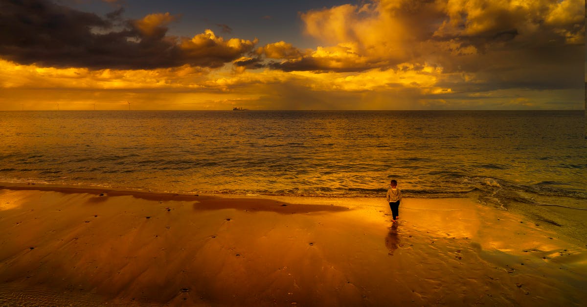 Kids cannot access gold content with Xbox Live Gold Sharing - Child Standing on Seashore