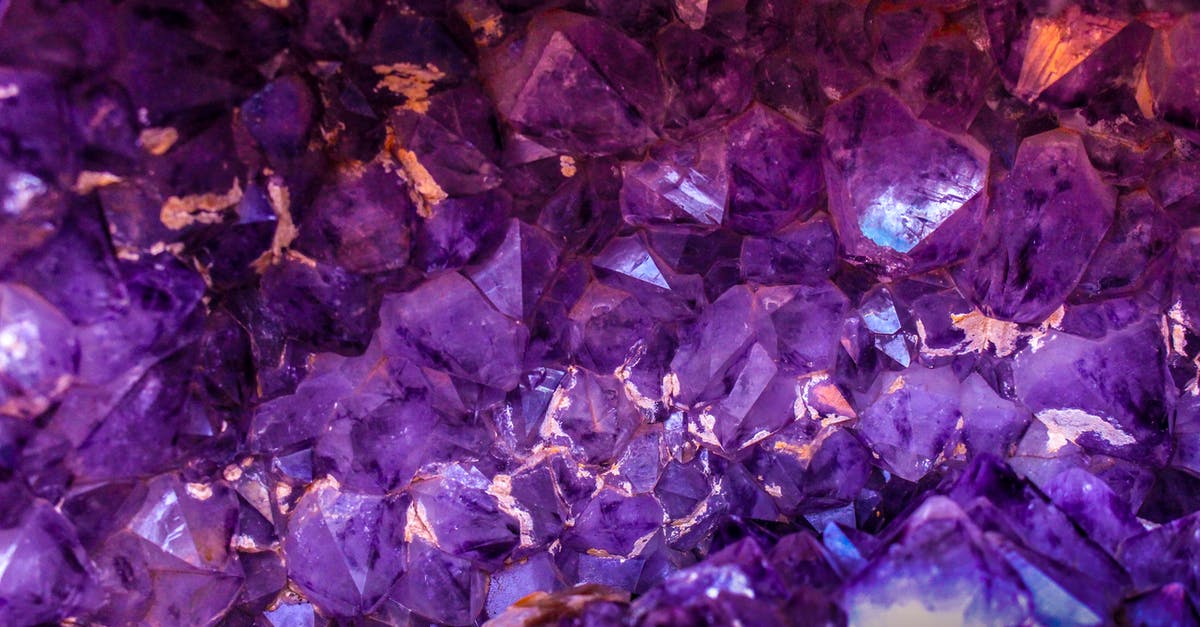 King of Thieves Gem spinner - Closeup Photo of Purple Gemstones King of Thieves Gem spinner - Closeup Photo of Purple Gemstones