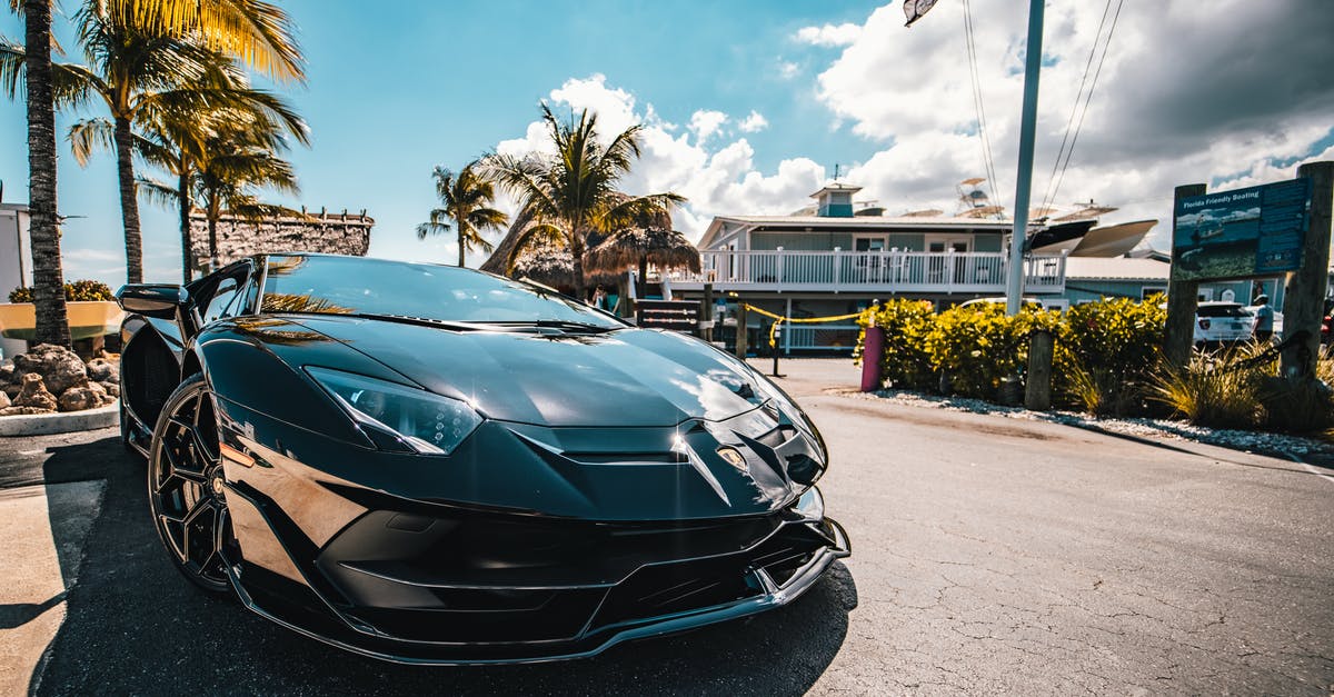 Lamborghini Centenario completes Barcelona in 8 secs - Shiny Black Car Parked on the Street Lamborghini Centenario completes Barcelona in 8 secs - Shiny Black Car Parked on the Street