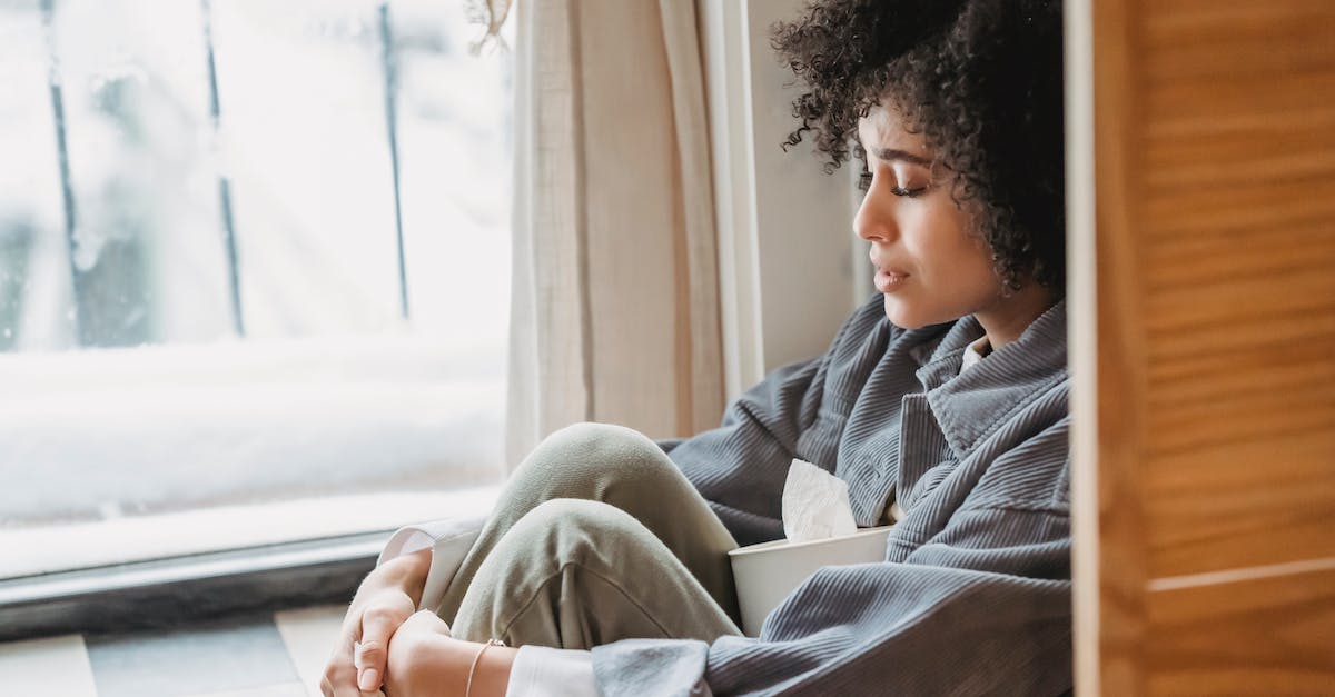 launcher problem 1.3.7 windows 7 64-bit at starting [closed] - Desperate black woman embracing knees suffering from difficulties