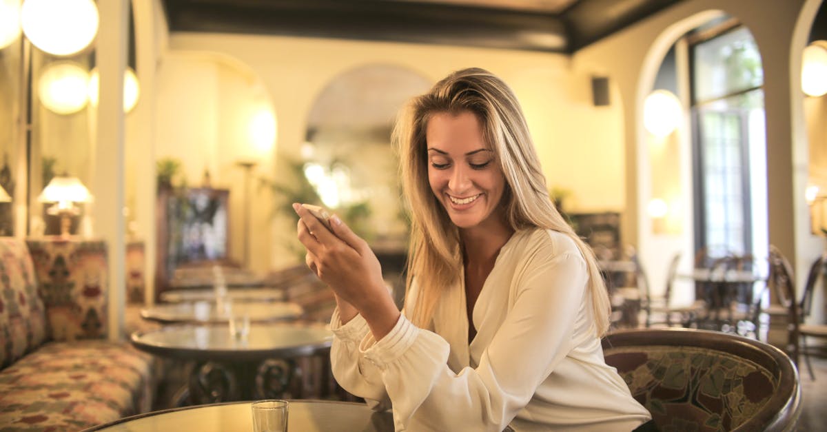 Leaping shot op in Online mode? - Cheerful female having drink in elegant bar Leaping shot op in Online mode? - Cheerful female having drink in elegant bar