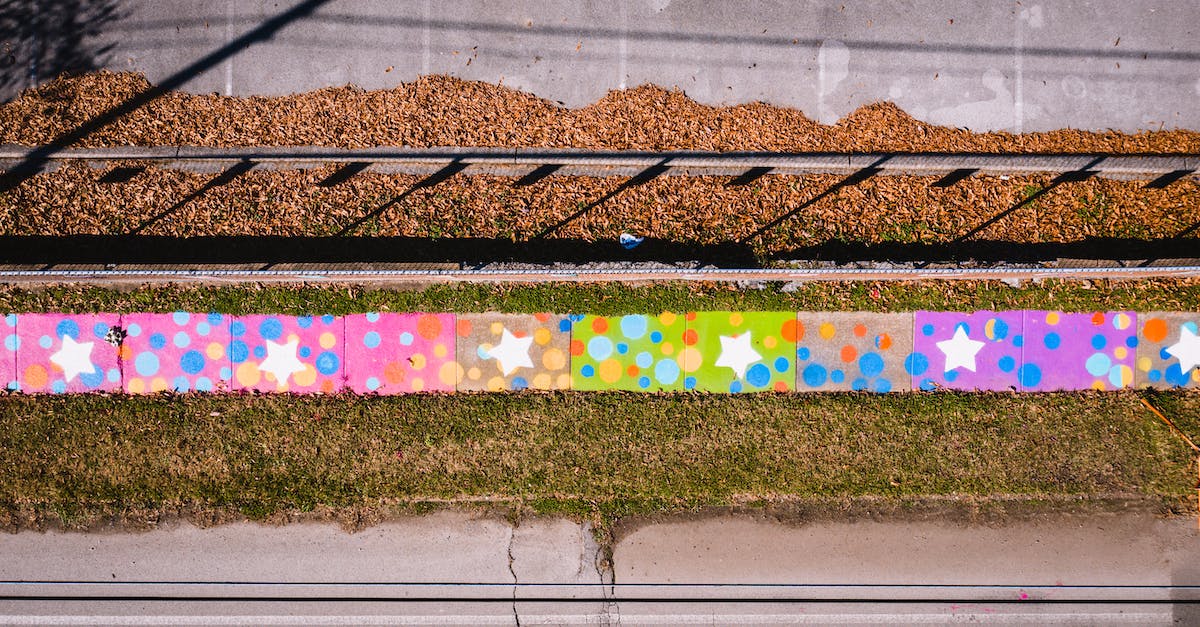 Leaving gold and elixir uncollected to prevent losing when raided - Colorful graffiti on concrete wall on sunny street Leaving gold and elixir uncollected to prevent losing when raided - Colorful graffiti on concrete wall on sunny street