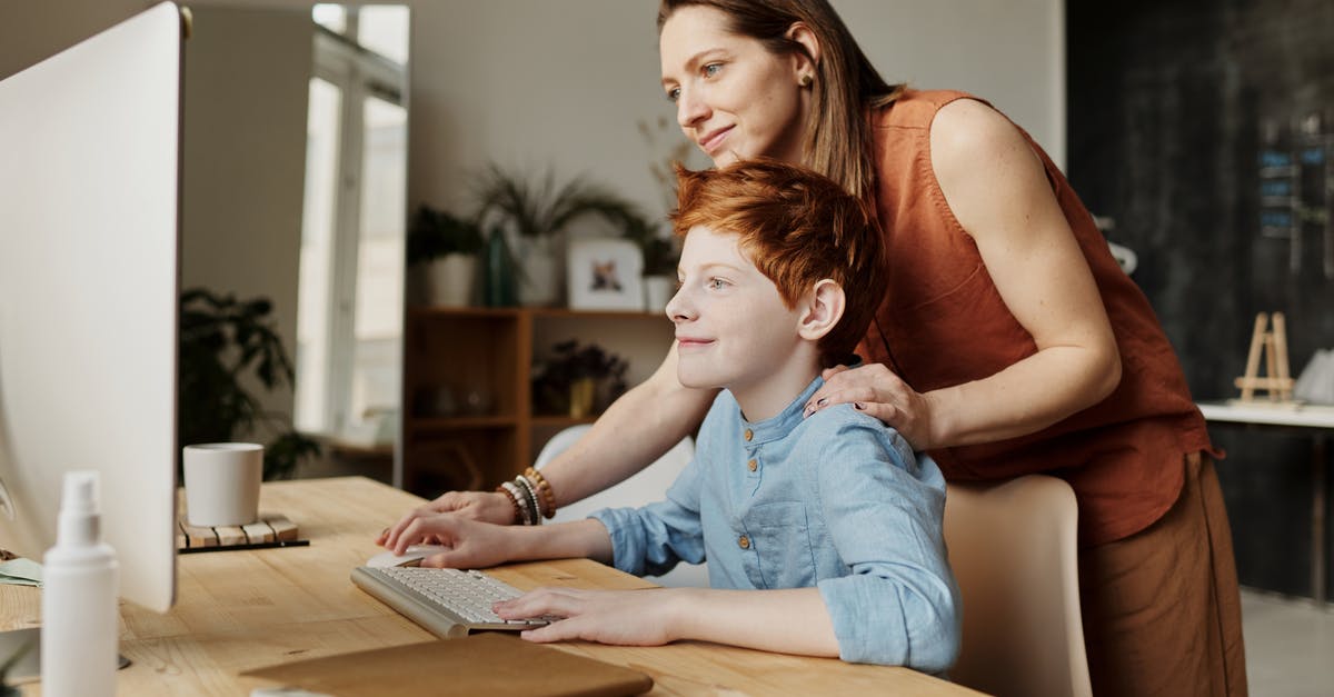 Legacy Console *Mini Game* worlds to PC help - Photo of Woman Teaching His Son While Smiling