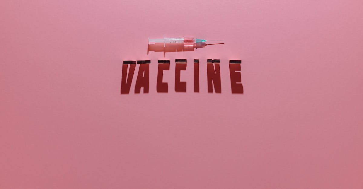 Level 2: "Four clever characters" - A Syringe and Vaccine Lettering Text on Pink Background Level 2: "Four clever characters" - A Syringe and Vaccine Lettering Text on Pink Background
