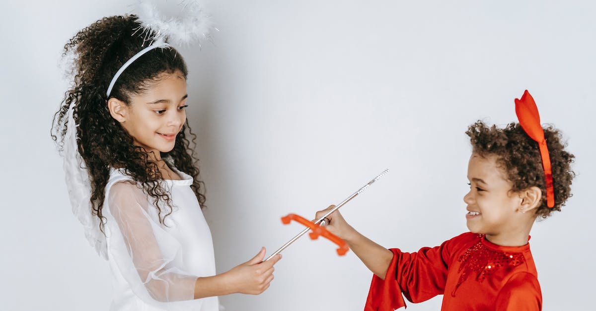 Level 50 veteran level 1 character, play the other alliance faction questlines, is character or content scaled? - Positive black kids pretending to be angel and devil in studio
