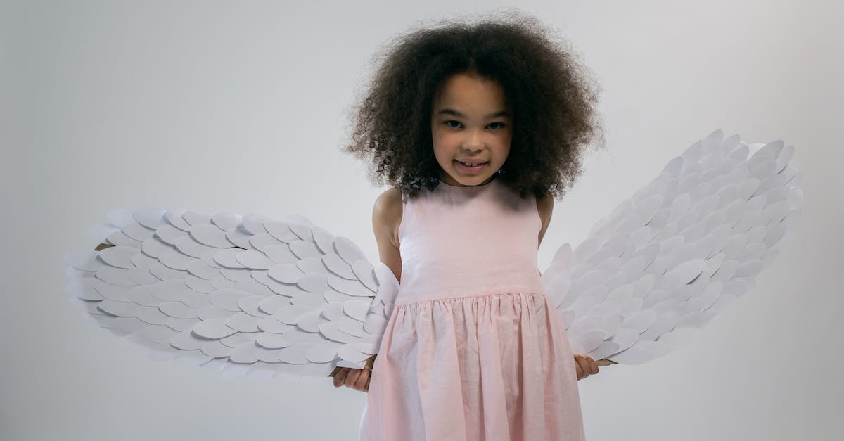 Level 50 veteran level 1 character, play the other alliance faction questlines, is character or content scaled? - Cute little African American kid with angel wings smiling at camera
