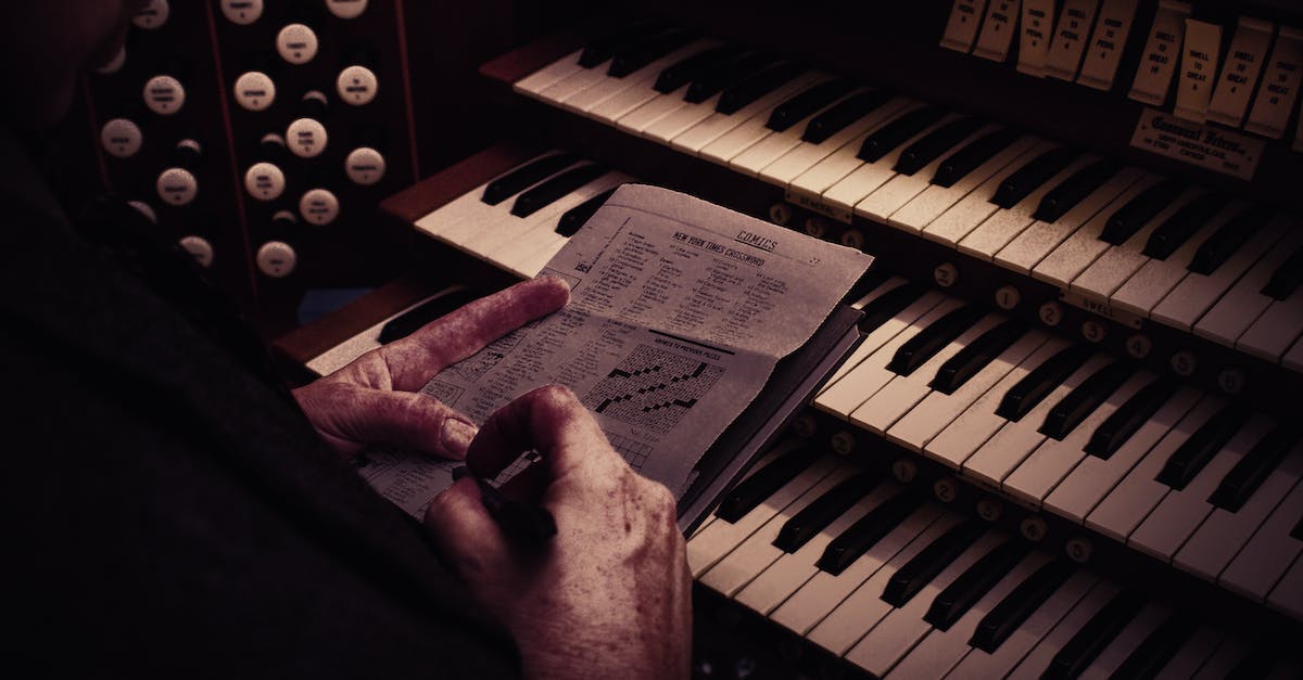 Level 9 PI vim adventures pi puzzle - Person Playing Piano With White Paper on Top Level 9 PI vim adventures pi puzzle - Person Playing Piano With White Paper on Top