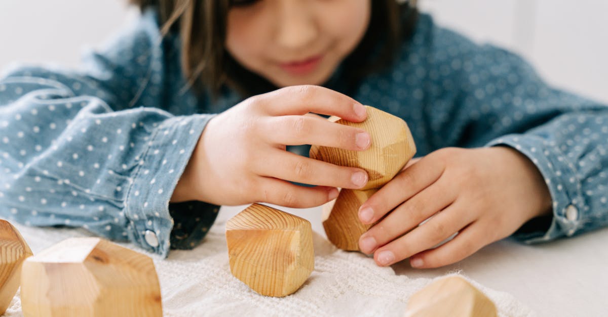 Leveling up in solo-play? - Girl in Blue and White Long Sleeve Shirt Holding Brown Wooden Board Leveling up in solo-play? - Girl in Blue and White Long Sleeve Shirt Holding Brown Wooden Board