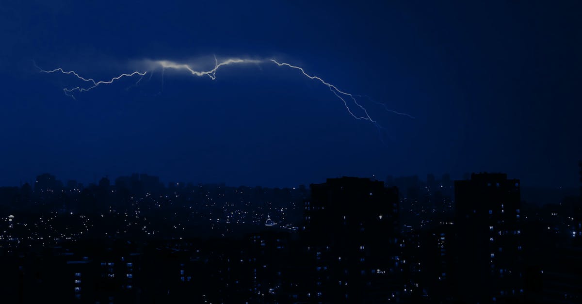 Lighting a portal in Minecraft - Lightning over City at Night