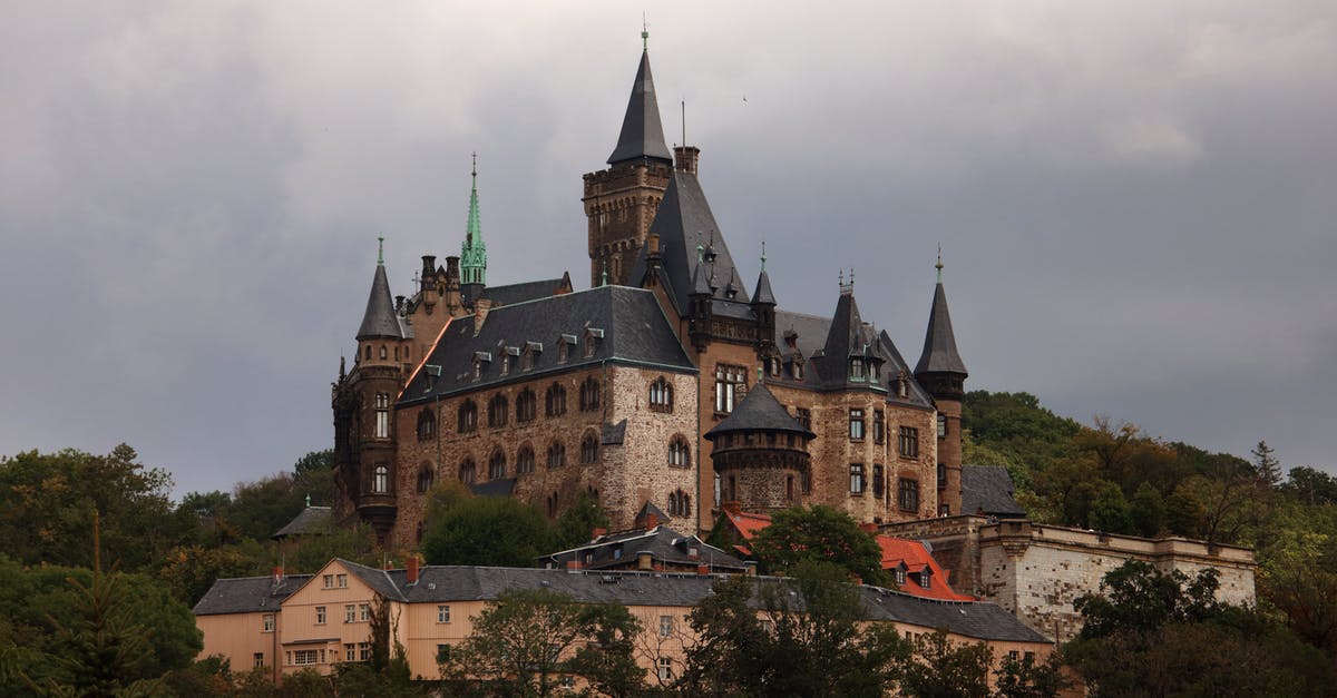 Lilith and Bloodshot Stronghold - Brown and Gray Concrete Castle Under Cloudy Sky Lilith and Bloodshot Stronghold - Brown and Gray Concrete Castle Under Cloudy Sky