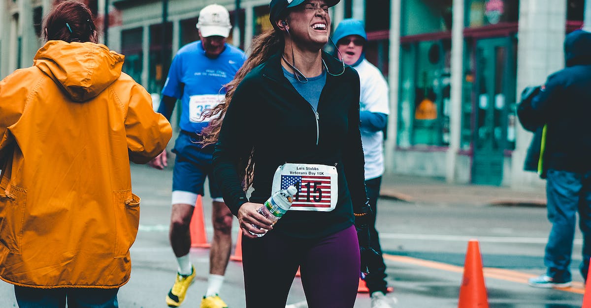 Limit On Number Of Simultaneous Actions? [duplicate] - People Standing on Road Beside Building