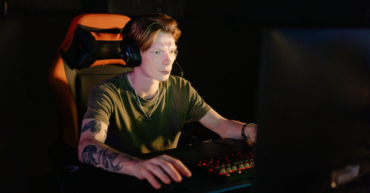 Load certain entities only when a player is near - A Man in Green Crew Neck T-shirt Playing Computer Games Load certain entities only when a player is near - A Man in Green Crew Neck T-shirt Playing Computer Games