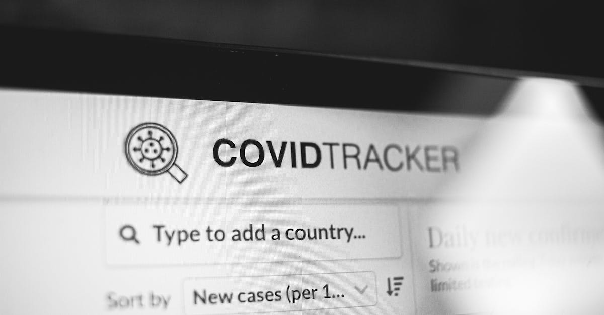Load world from PC to PE [duplicate] - COVID Tracker title on website of laptop screen