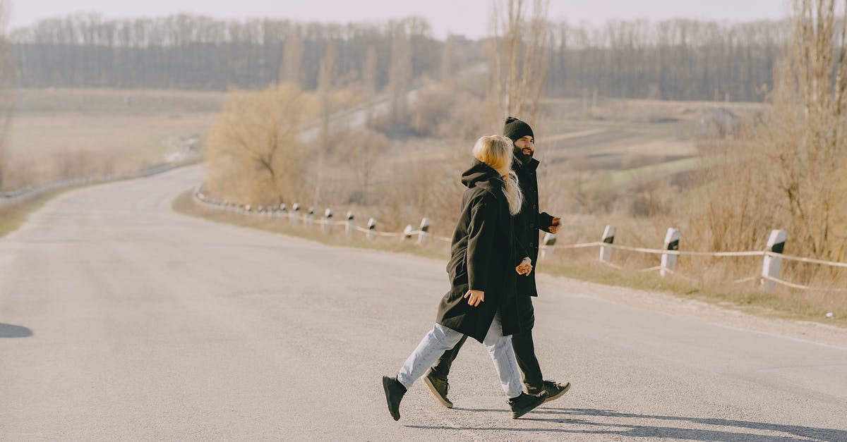 Location of Freeciv Rule Files on Linux - Young couple crossing road in wrong place at countryside Location of Freeciv Rule Files on Linux - Young couple crossing road in wrong place at countryside