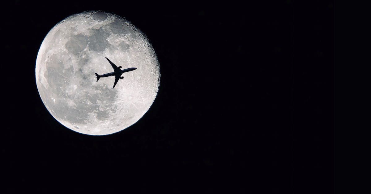 Lock up in space plane hangar issue - Silhouette of Airplane in front of Full Moon Lock up in space plane hangar issue - Silhouette of Airplane in front of Full Moon
