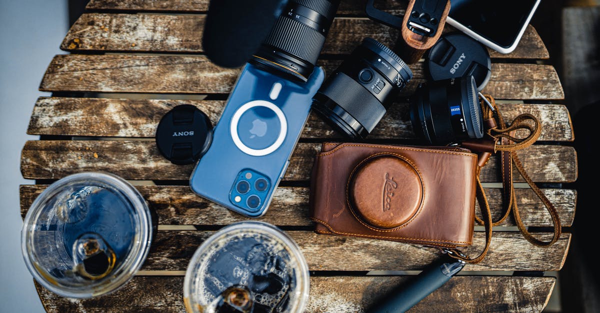 Logging in on a different phone - Set of photographer with smartphone on table