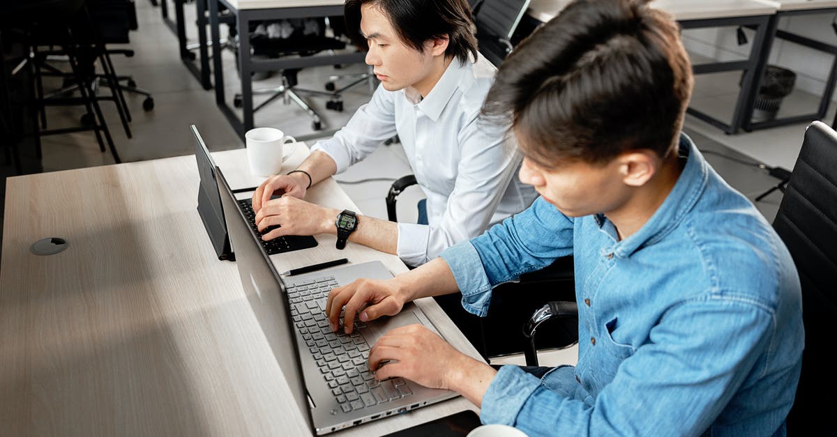 Longer commmand execution - Man in Blue Dress Shirt Using Macbook Pro