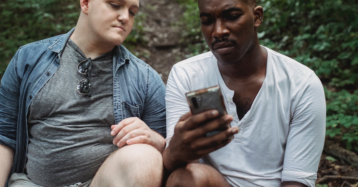 Lost My sultan on gta online - Concentrated multiethnic male travelers surfing internet while relaxing in woodland in daytime on blurred background Lost My sultan on gta online - Concentrated multiethnic male travelers surfing internet while relaxing in woodland in daytime on blurred background