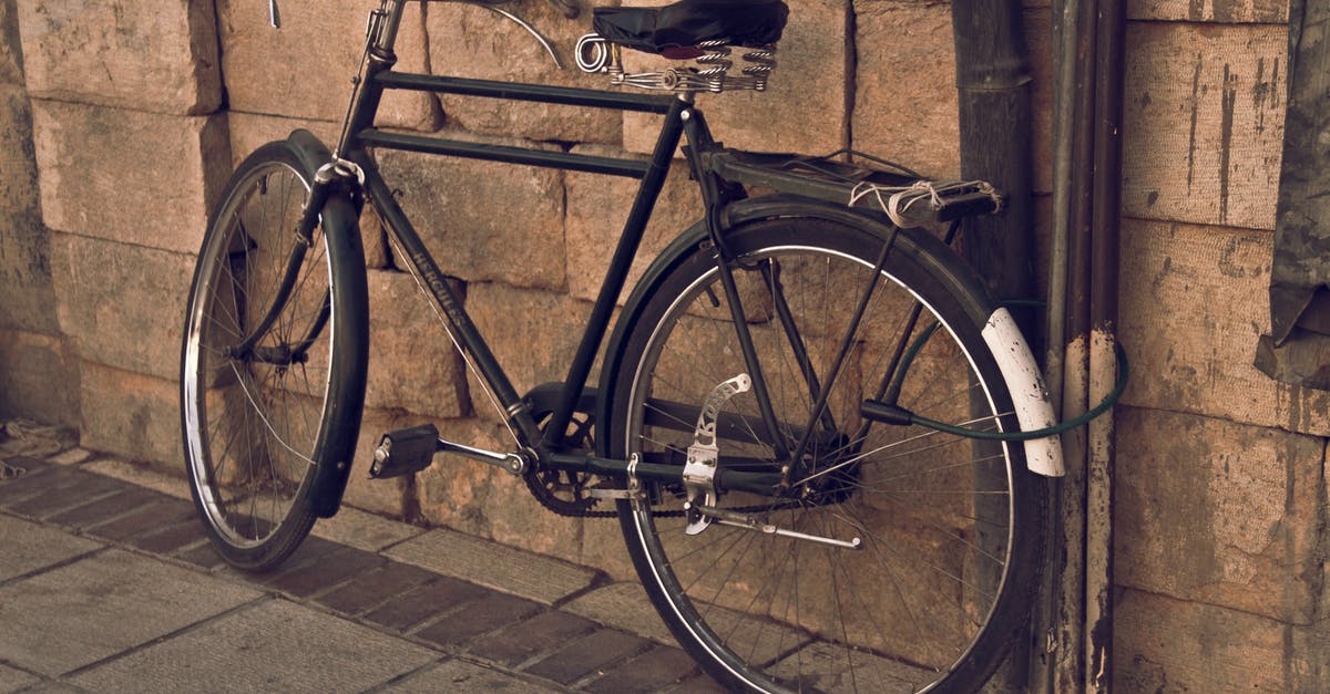 Lucia is gone. Just gone - Black City Bicycle Leaning on Wall
