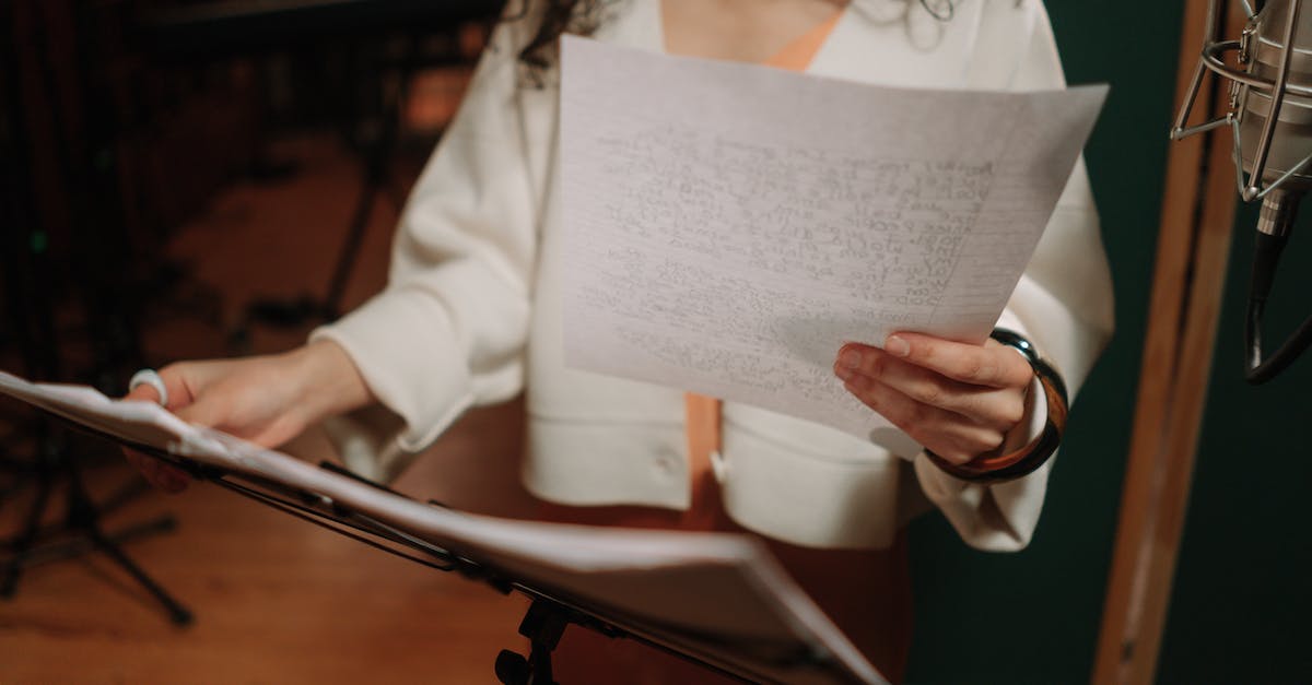 Lyrics from Afterlife soundtrack - Close-Up Shot of an Artist Holding a Paper