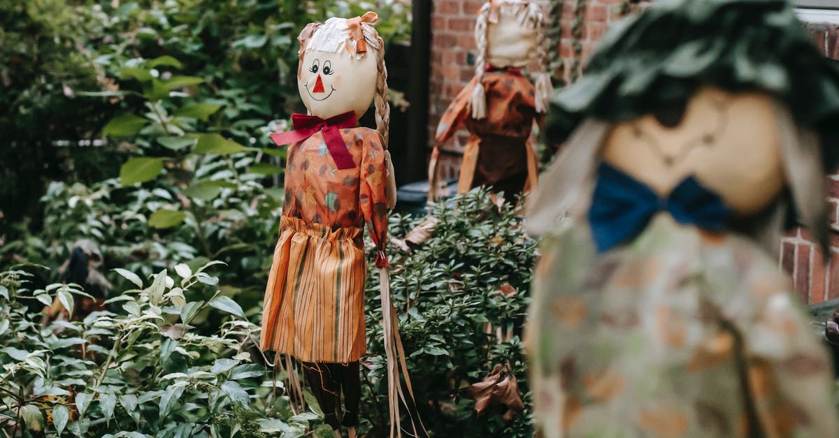 Mêlée cipher character build - Terrible figurines of fictional characters near entrance of brick building with lush vegetation on Halloween Mêlée cipher character build - Terrible figurines of fictional characters near entrance of brick building with lush vegetation on Halloween
