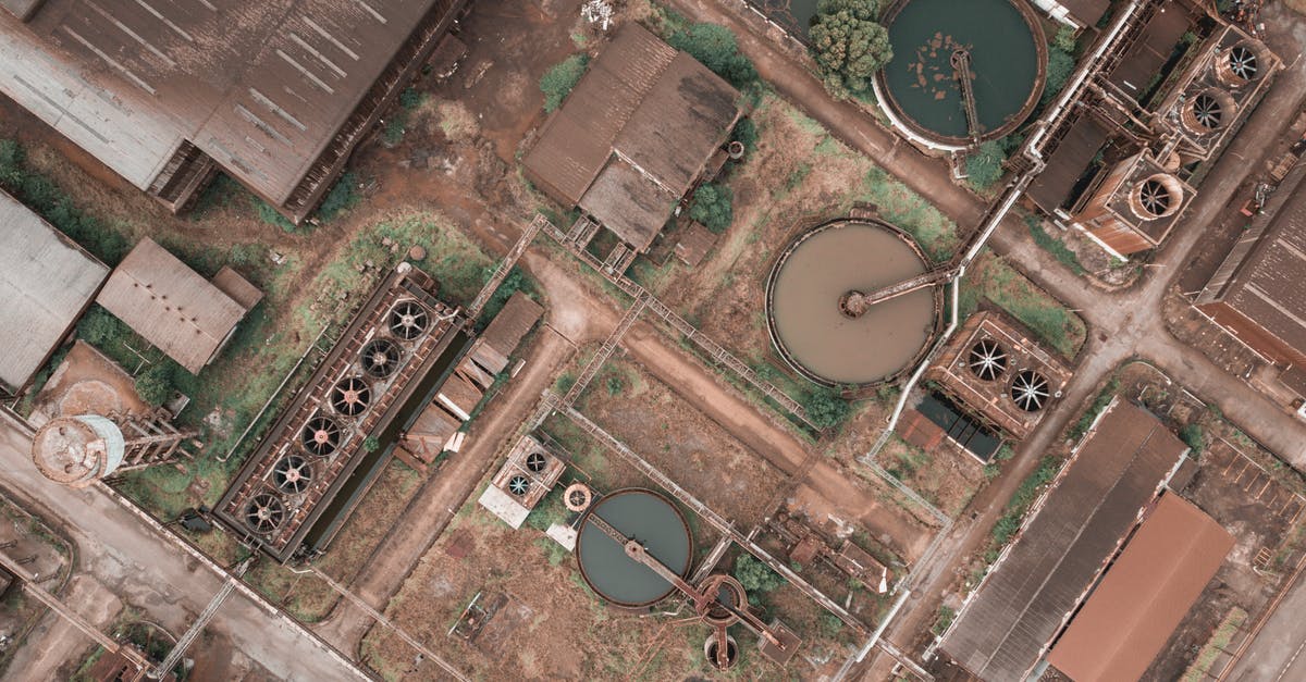Macready uses ammo supply differently when equipped in power armor - Drone view of shabby factory with round settling tanks with mechanical means removing solids in water treatment plant Macready uses ammo supply differently when equipped in power armor - Drone view of shabby factory with round settling tanks with mechanical means removing solids in water treatment plant