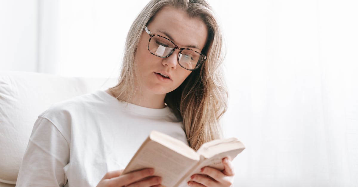 Main story of Gta5 ps3 missions won't load - Young woman in eyeglasses reading book at spare time Main story of Gta5 ps3 missions won't load - Young woman in eyeglasses reading book at spare time