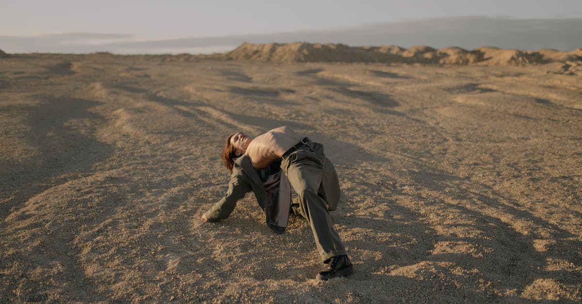 Maintaining control during probe atmospheric landing with RemoteTech - Man in Brown Jacket and Black Pants Sitting on Brown Sand Maintaining control during probe atmospheric landing with RemoteTech - Man in Brown Jacket and Black Pants Sitting on Brown Sand