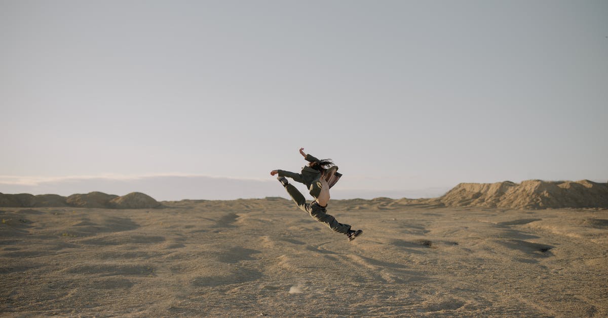 Maintaining control during probe atmospheric landing with RemoteTech - Man in Black Jacket and Black Pants Jumping on Brown Rock Formation Maintaining control during probe atmospheric landing with RemoteTech - Man in Black Jacket and Black Pants Jumping on Brown Rock Formation