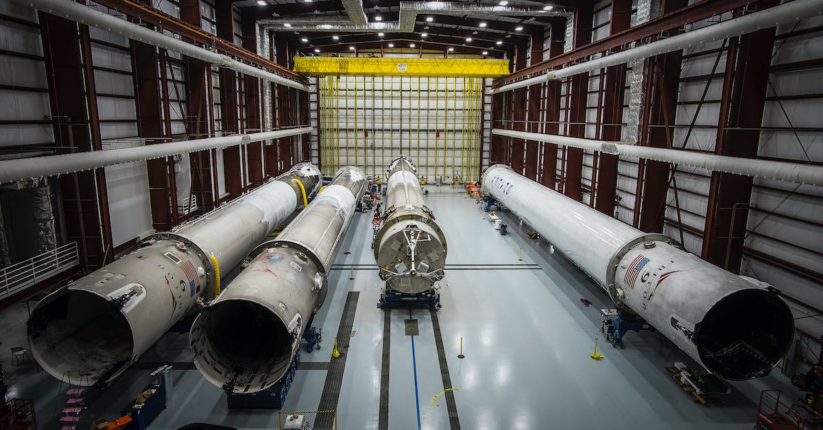 Make Logistic Pipes auto craft Iron Blocks - Various huge metal details and fragments of unfinished rocket located in contemporary assembly factory Make Logistic Pipes auto craft Iron Blocks - Various huge metal details and fragments of unfinished rocket located in contemporary assembly factory