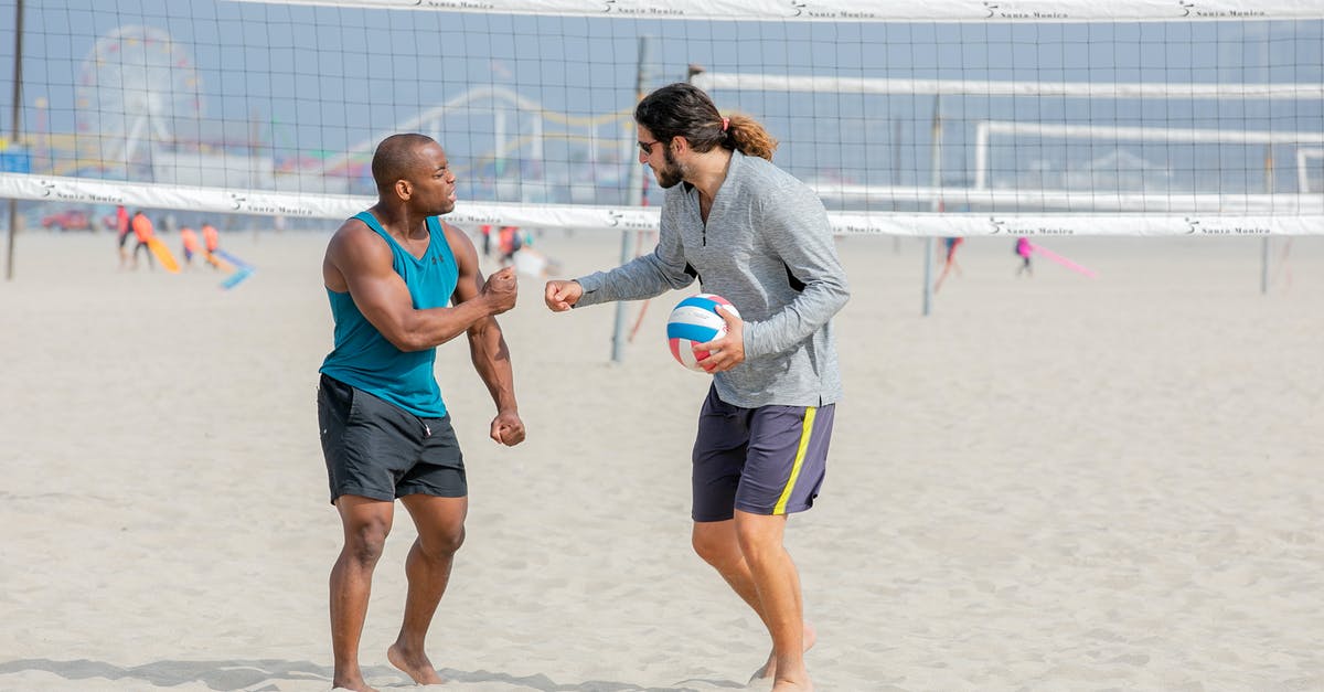 Making Command blocks send redstone currents upon player death - Two Beach Volleyball Giving Fist Bump Gesture