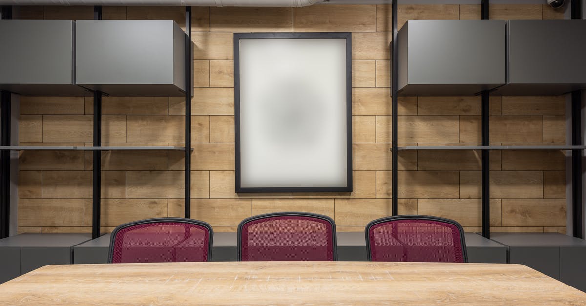 Making items bigger in the item frame - Contemporary interior of new boardroom equipped with wooden table and red office chairs Making items bigger in the item frame - Contemporary interior of new boardroom equipped with wooden table and red office chairs