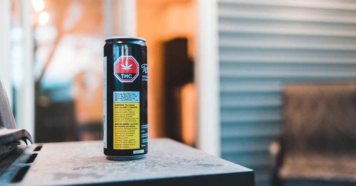 Marking Stores that can be robbed Offline - Colorful can of cannabis drink with text and image on shiny surface in building Marking Stores that can be robbed Offline - Colorful can of cannabis drink with text and image on shiny surface in building