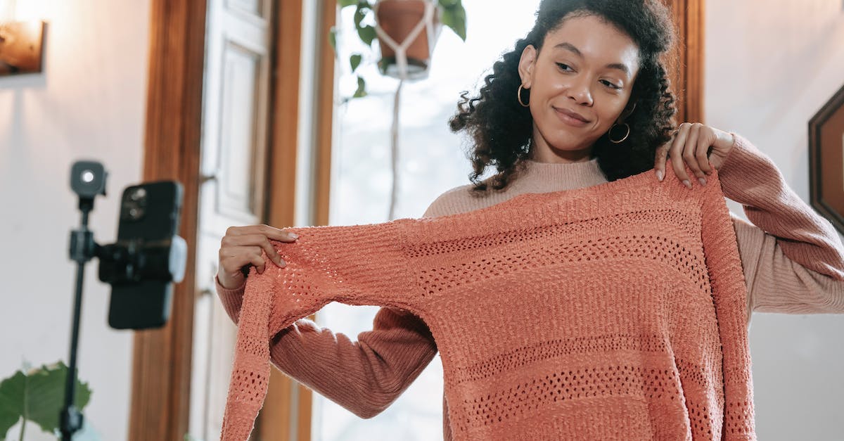 Massive FPS Drop in Minecraft when I try to record with OBS - Smiling ethnic woman trying on sweater and filming video