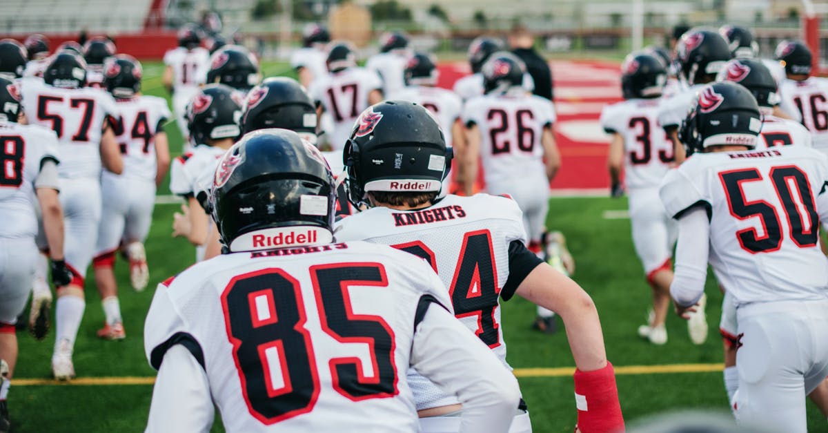 Maximum number of survivors in team - Football Players in Red and White Jersey Shirt Maximum number of survivors in team - Football Players in Red and White Jersey Shirt