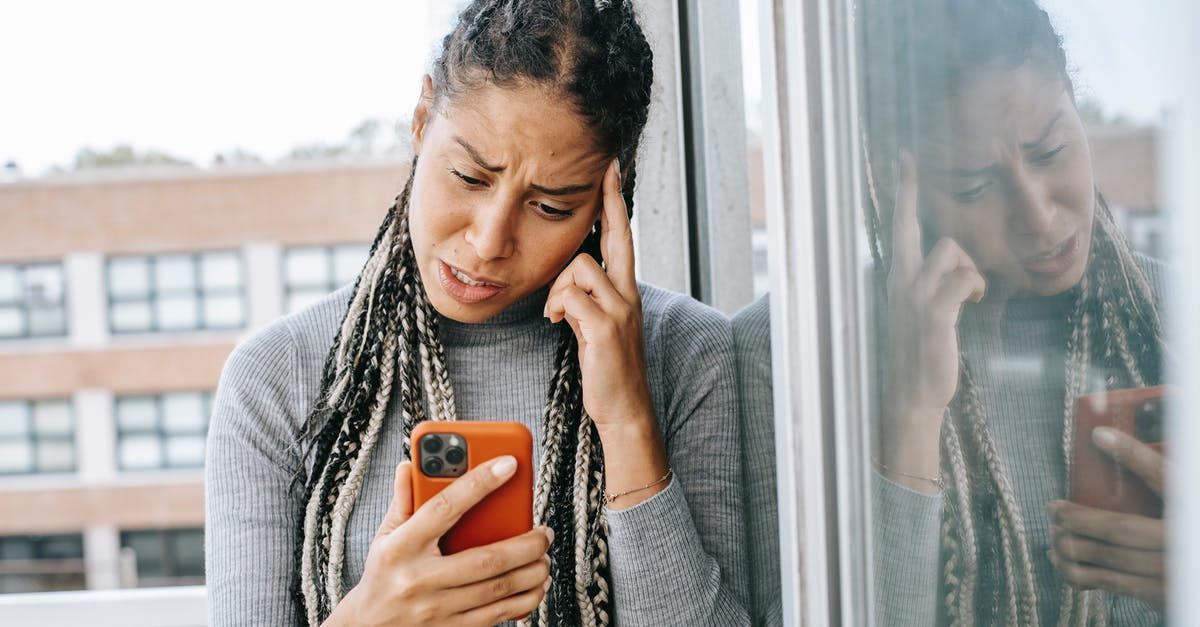 Mcedit not seeing Minecraft App on Windows 10 - Tired black woman browsing mobile phone Mcedit not seeing Minecraft App on Windows 10 - Tired black woman browsing mobile phone