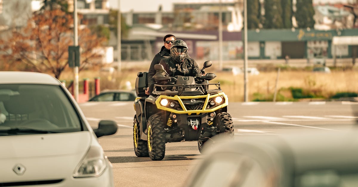 ME3 Helmet is OFF all the time despite menu setting 'default'. Am I missing something? - Unrecognizable friends riding quad bike on city road in sunlight ME3 Helmet is OFF all the time despite menu setting 'default'. Am I missing something? - Unrecognizable friends riding quad bike on city road in sunlight