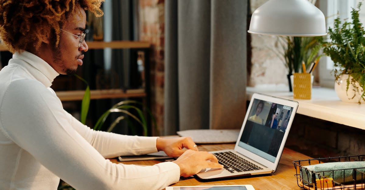Meeting Axel in Super Overlord Descent - Woman in White Long Sleeve Shirt Using Macbook Air